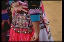 Hmong silver coins on New Year costume, Khek Noi, Thailand, 1986