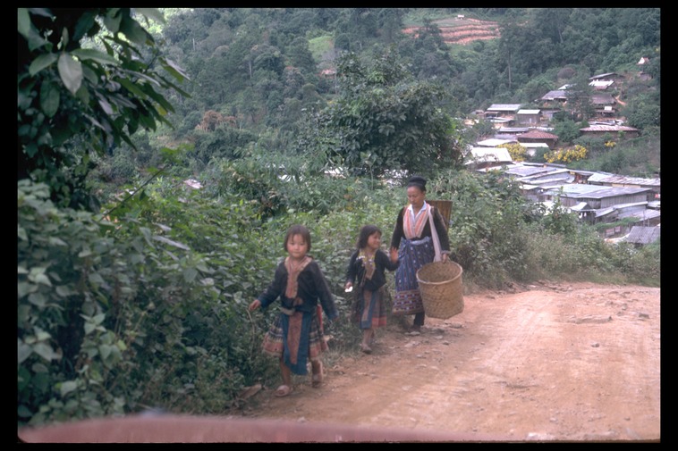 Hmong walking home from market, Thailand, 1986